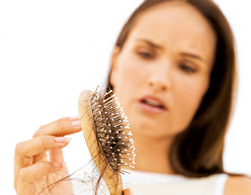 El medio de la caída de los cabello en el frasco